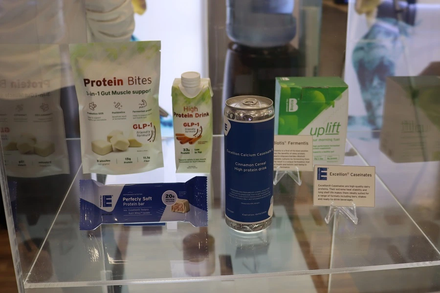 trade show booth with high protein products in glass case